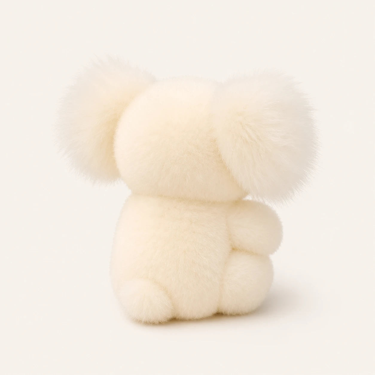 Peluche koala blanc vue de dos, montrant la fourrure duveteuse