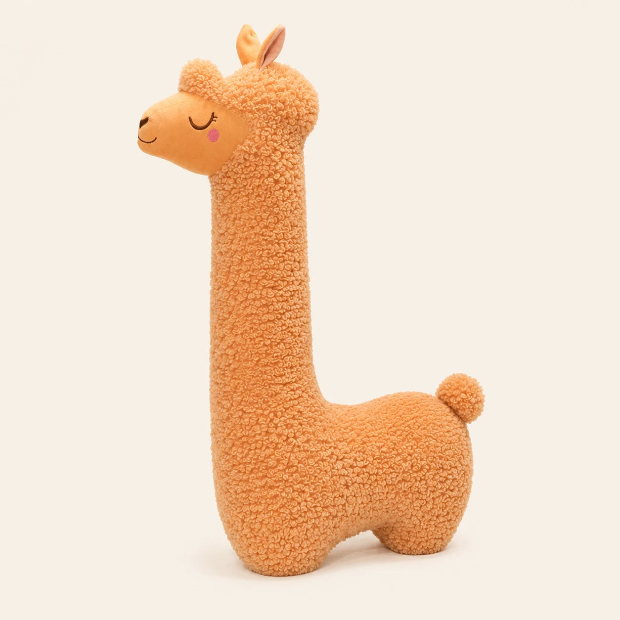 Peluche alpaga vue de l'autre côté sur fond ivoire