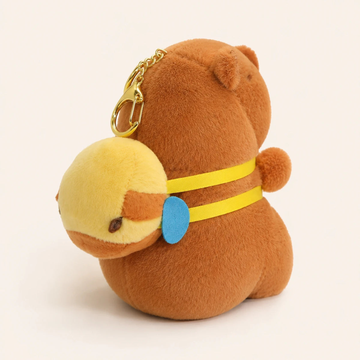 Peluche capybara brun vue de profil