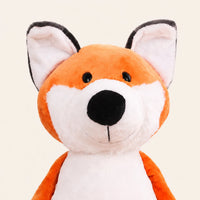 Gros plan sur le visage de la peluche renard