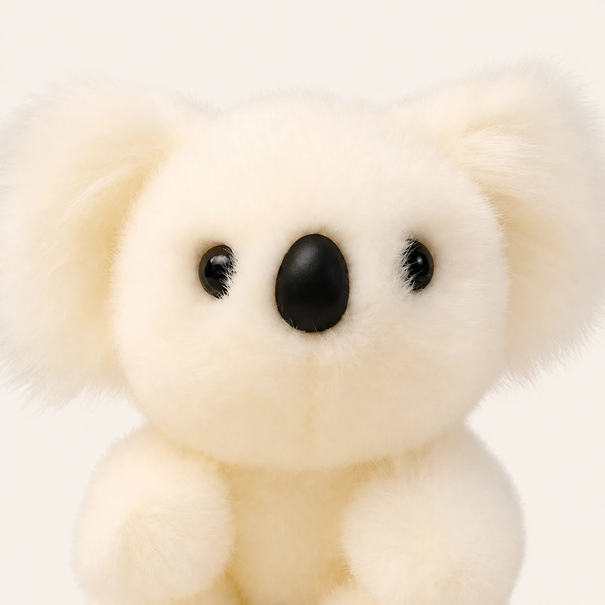 Gros plan sur le visage du koala en peluche, nez et yeux