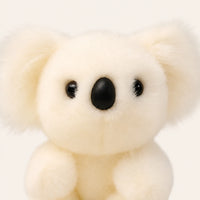 Gros plan sur le visage du koala en peluche, nez et yeux