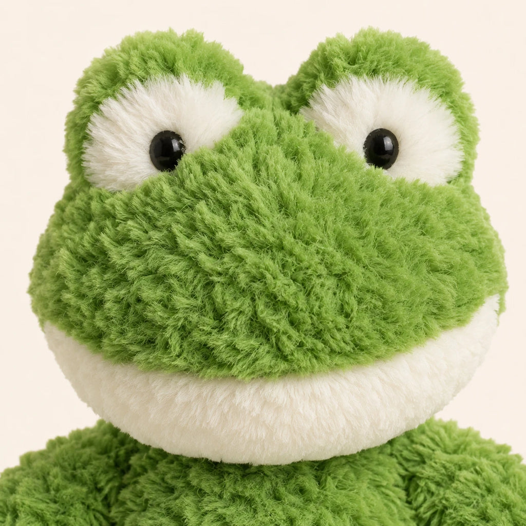 Peluche grenouille longues pattes 35 cm, gros plan sur le visage