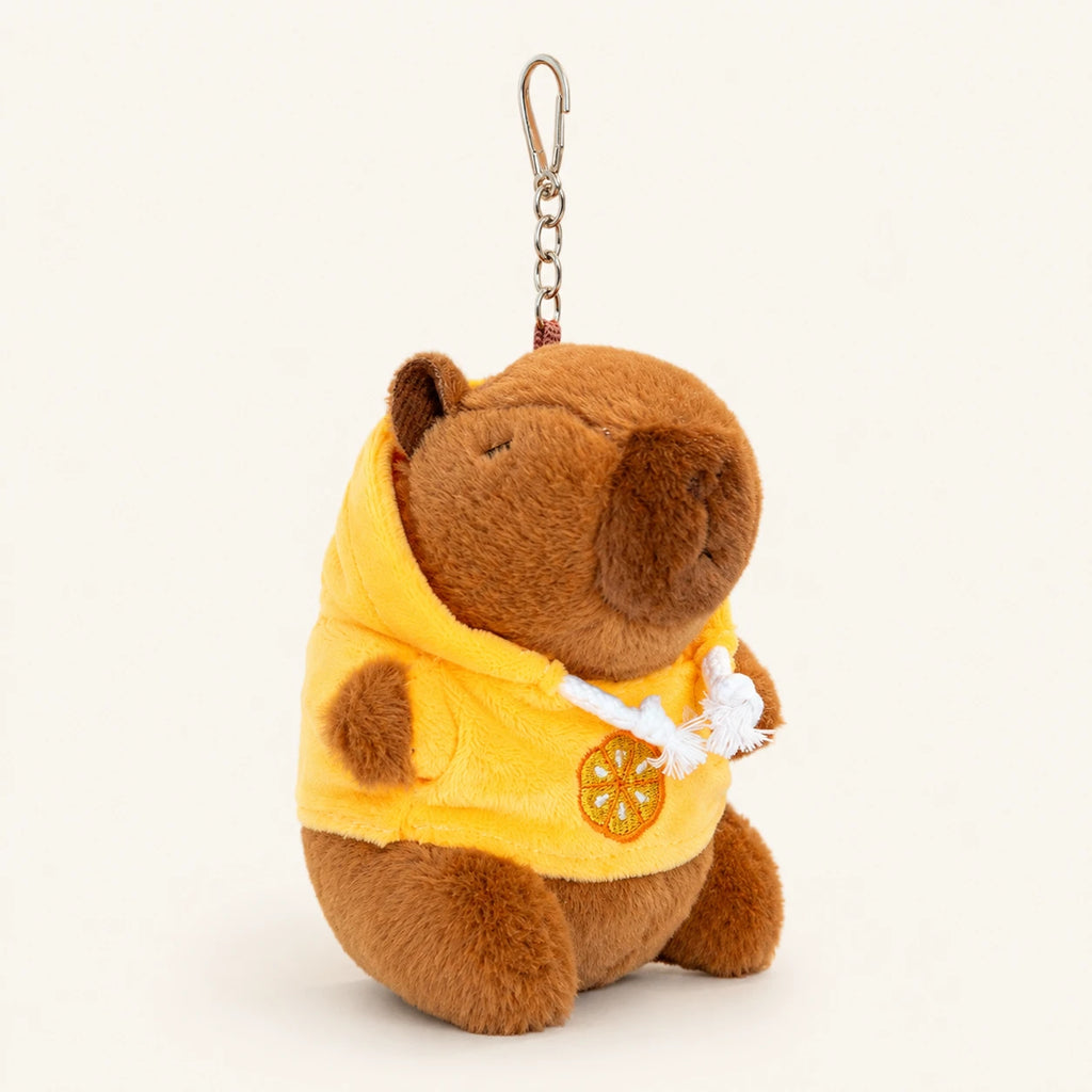 Peluche porte-clés capybara à capuche jaune, vue de face