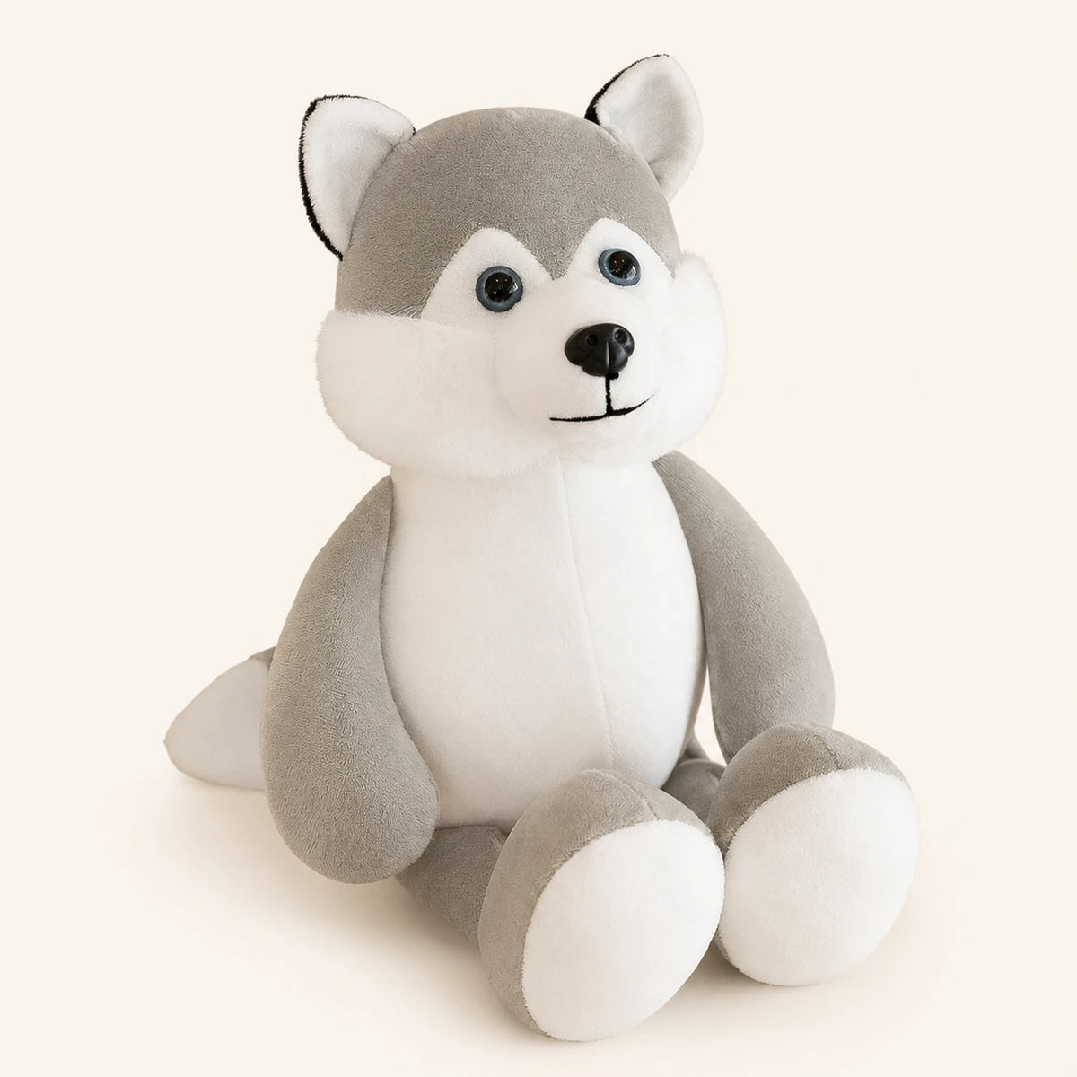 Peluche husky gris assise, vue principale, fond ivoire