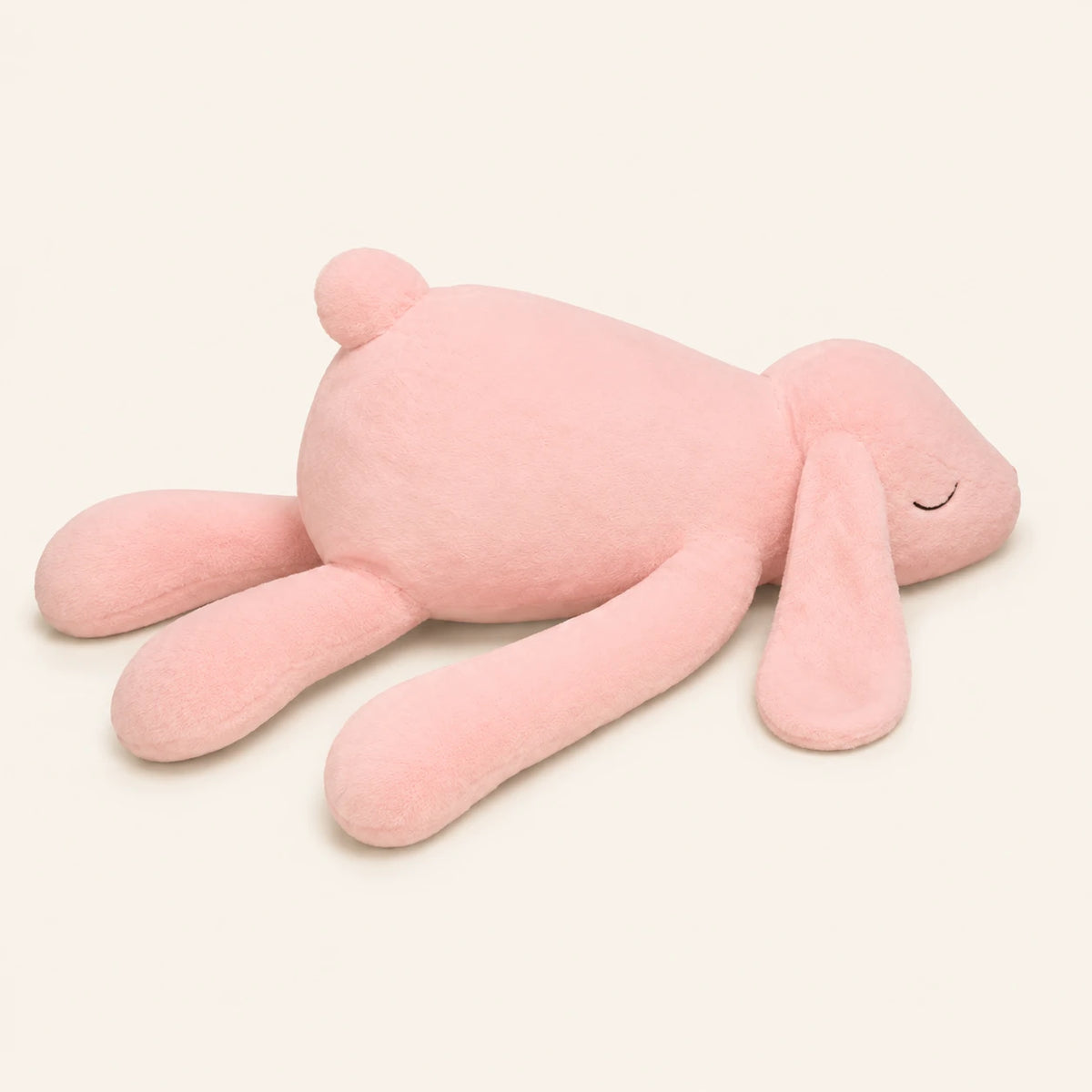 Peluche lapin géant rose, autre angle sur fond ivoire