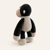 Peluche singe gorille vue de profil, fond ivoire