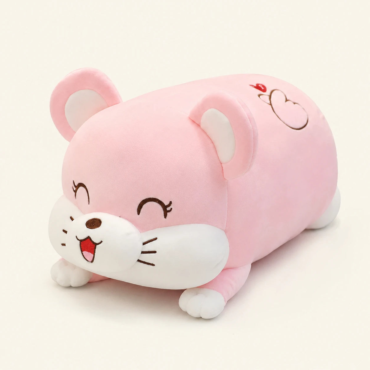 Grand coussin peluche rose allongé, vue de face sur fond ivoire
