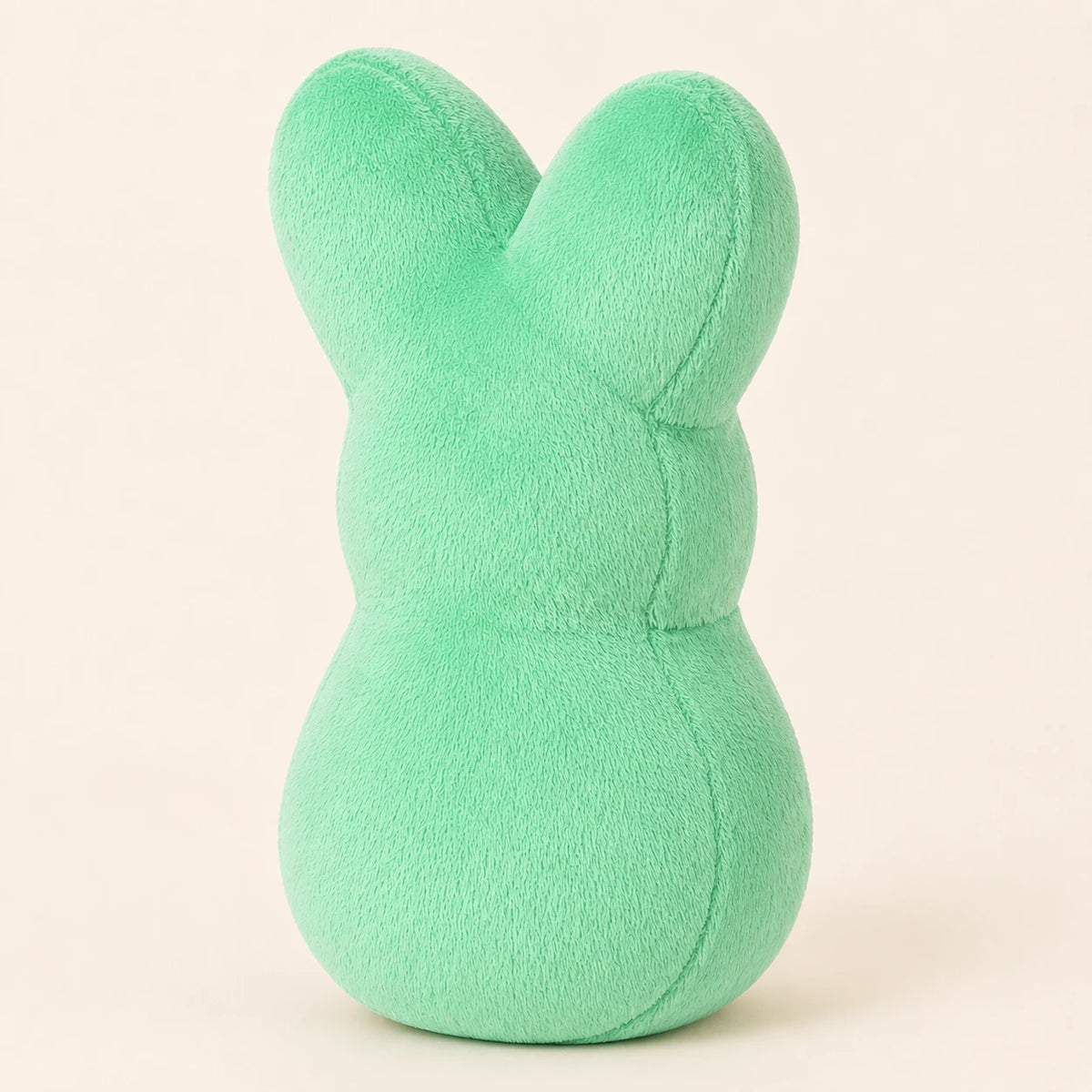 Peluche lapin peeps vert, autre angle sur fond ivoire