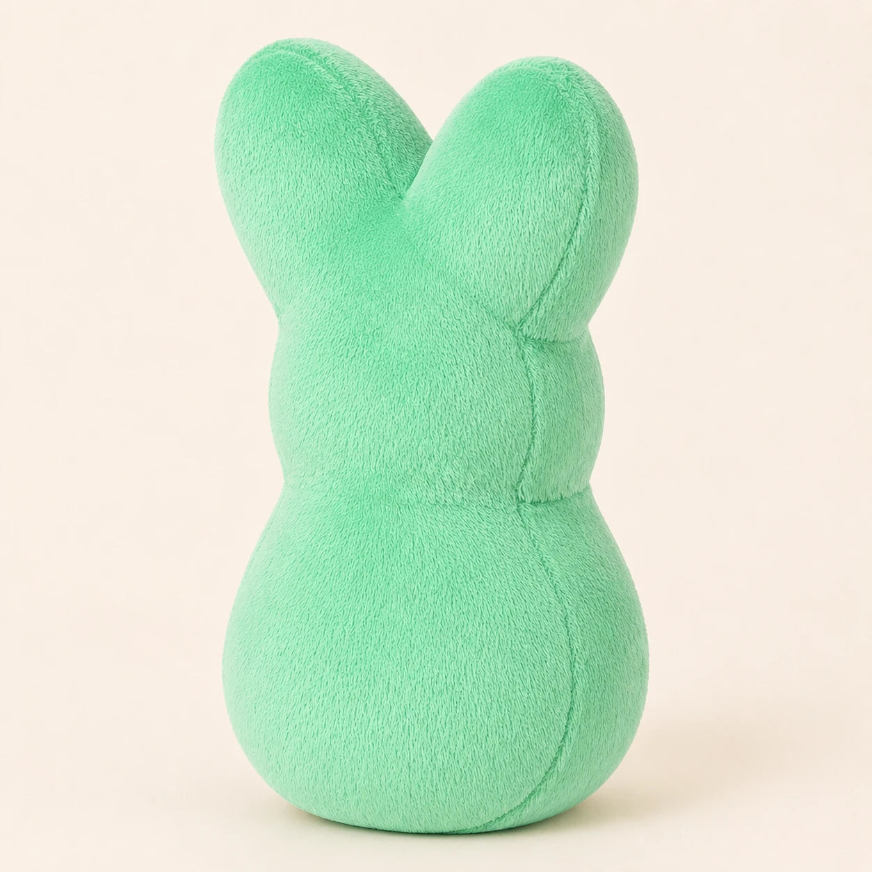 Peluche lapin peeps vert, autre angle sur fond ivoire