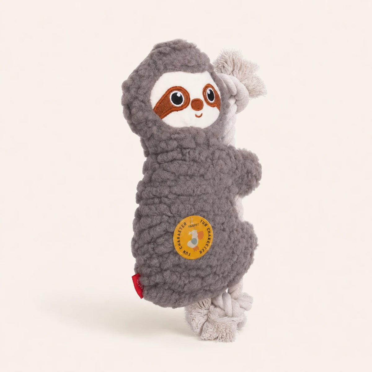 Jouet peluche paresseux pour chien, autre angle, fond ivoire