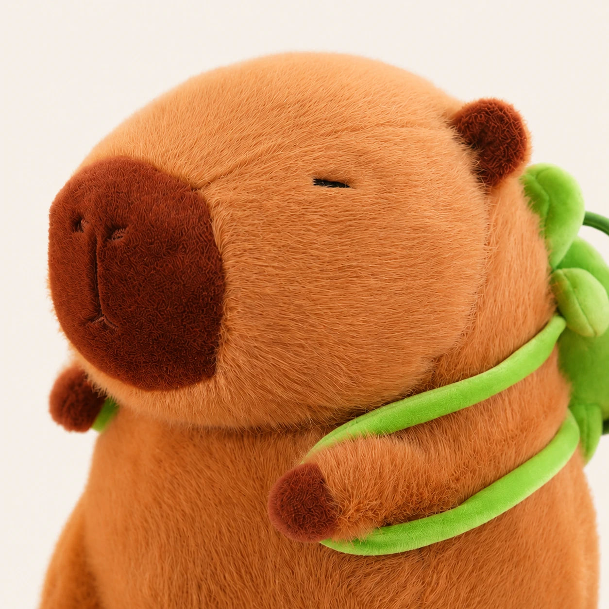 Peluche capybara, gros plan sur le visage et la texture