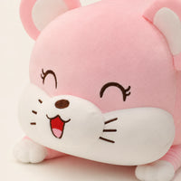 Gros plan sur le visage du coussin peluche rose