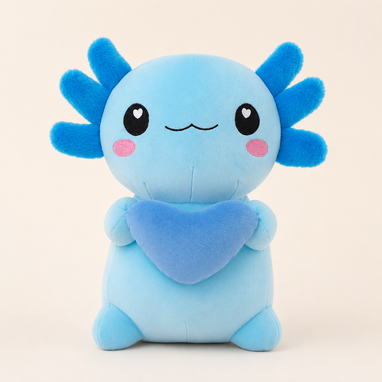 Peluche axolotl bleu avec cœur, vue principale sur fond ivoire