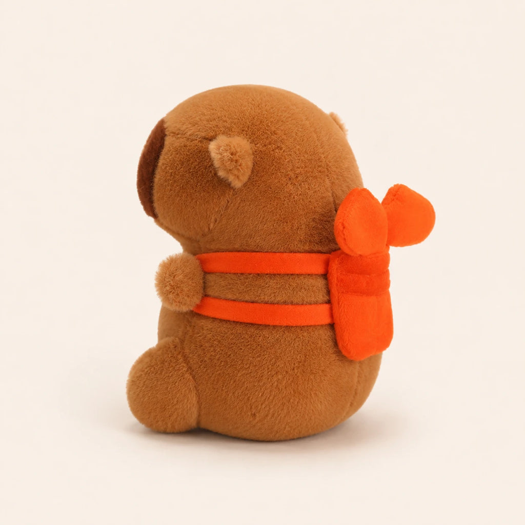 Peluche capybara brun vue de profil