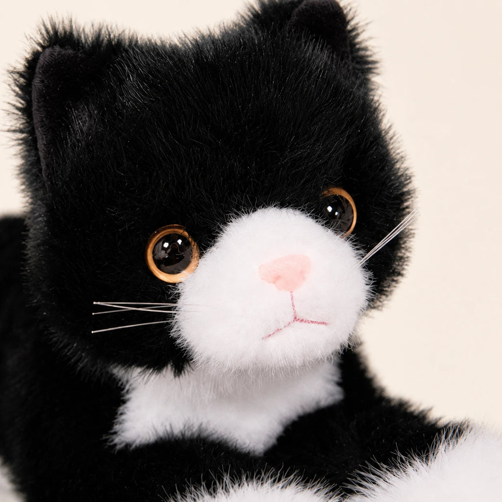 Peluche chat réaliste noir et blanc - détail visage