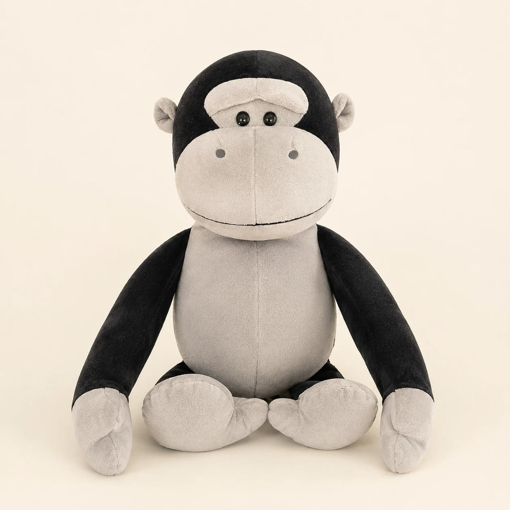 Peluche gorille noire et grise assise, vue principale sur fond ivoire