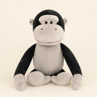 Peluche gorille noire et grise assise, vue principale sur fond ivoire