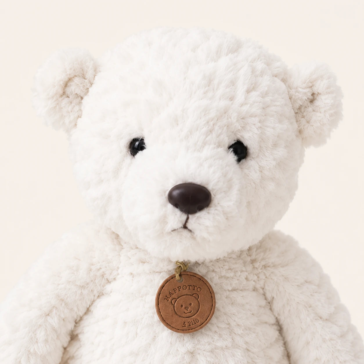 Peluche ours blanc longues pattes 50 cm, gros plan sur le visage