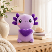 Peluche axolotl violet en situation sur une commode