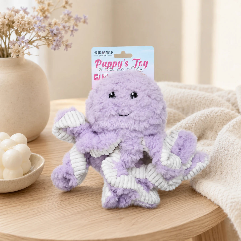 Jouet peluche pieuvre pour chien posé sur une table
