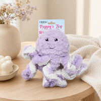 Jouet peluche pieuvre pour chien posé sur une table