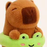 Gros plan sur le visage et la texture de la peluche capybara