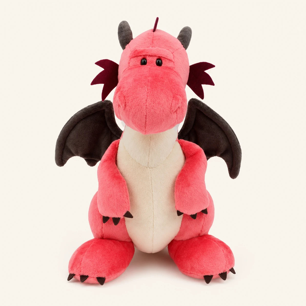 Peluche dragon rose corail ailes grises vue de face