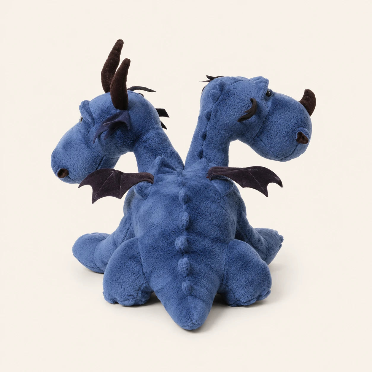 Peluche dragon bleu a deux tetes vue de dos