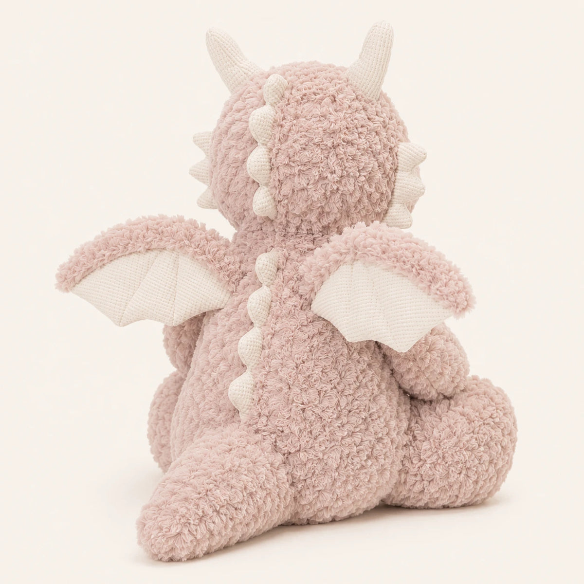 Peluche dragon rose vue de dos