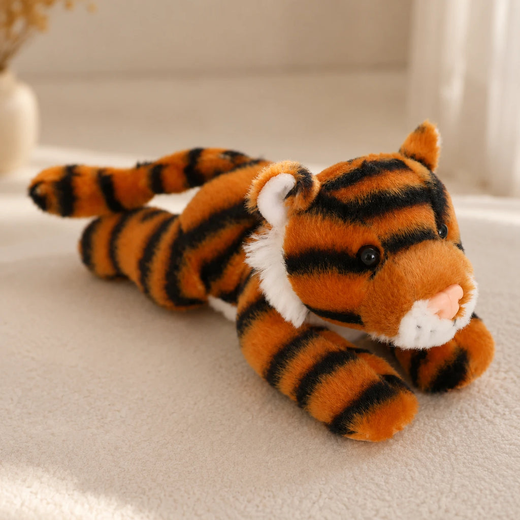 Peluche tigre en situation dans un interieur