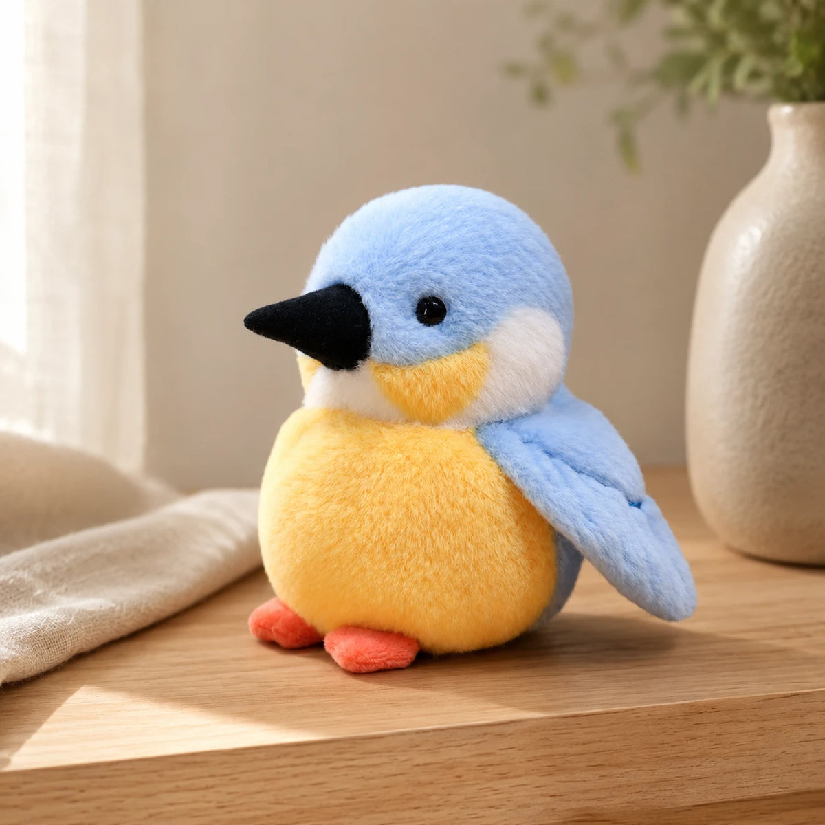 Peluche martin-pecheur en situation dans un interieur