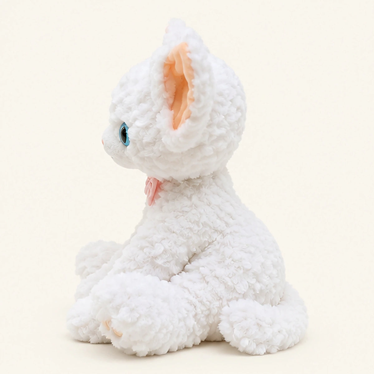 Peluche chat blanc boucle vue de profil