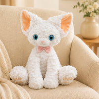 Peluche chat blanc boucle en situation