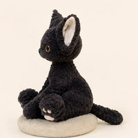 Peluche chat noir boucle vue de profil