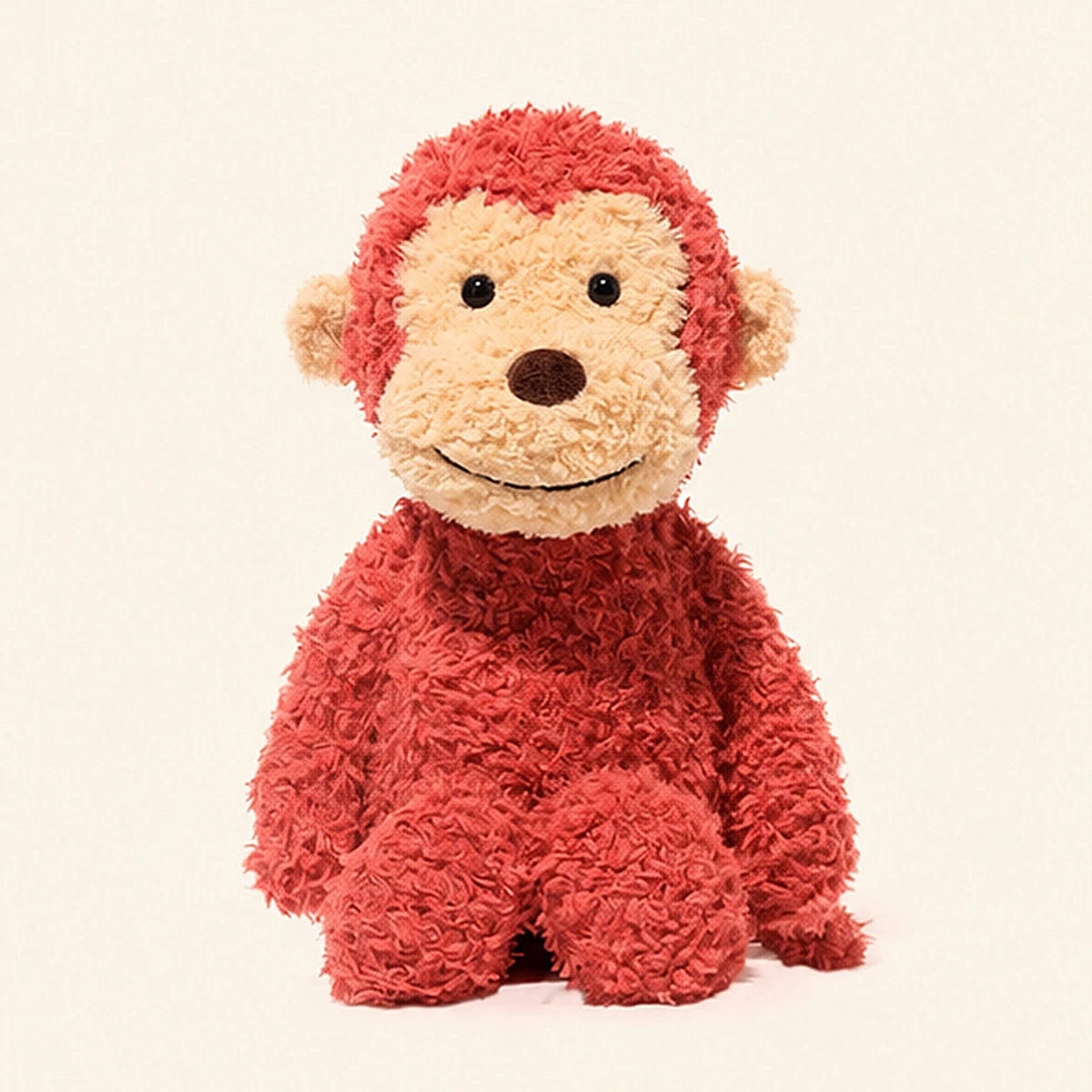 Peluche singe rouge vue de face