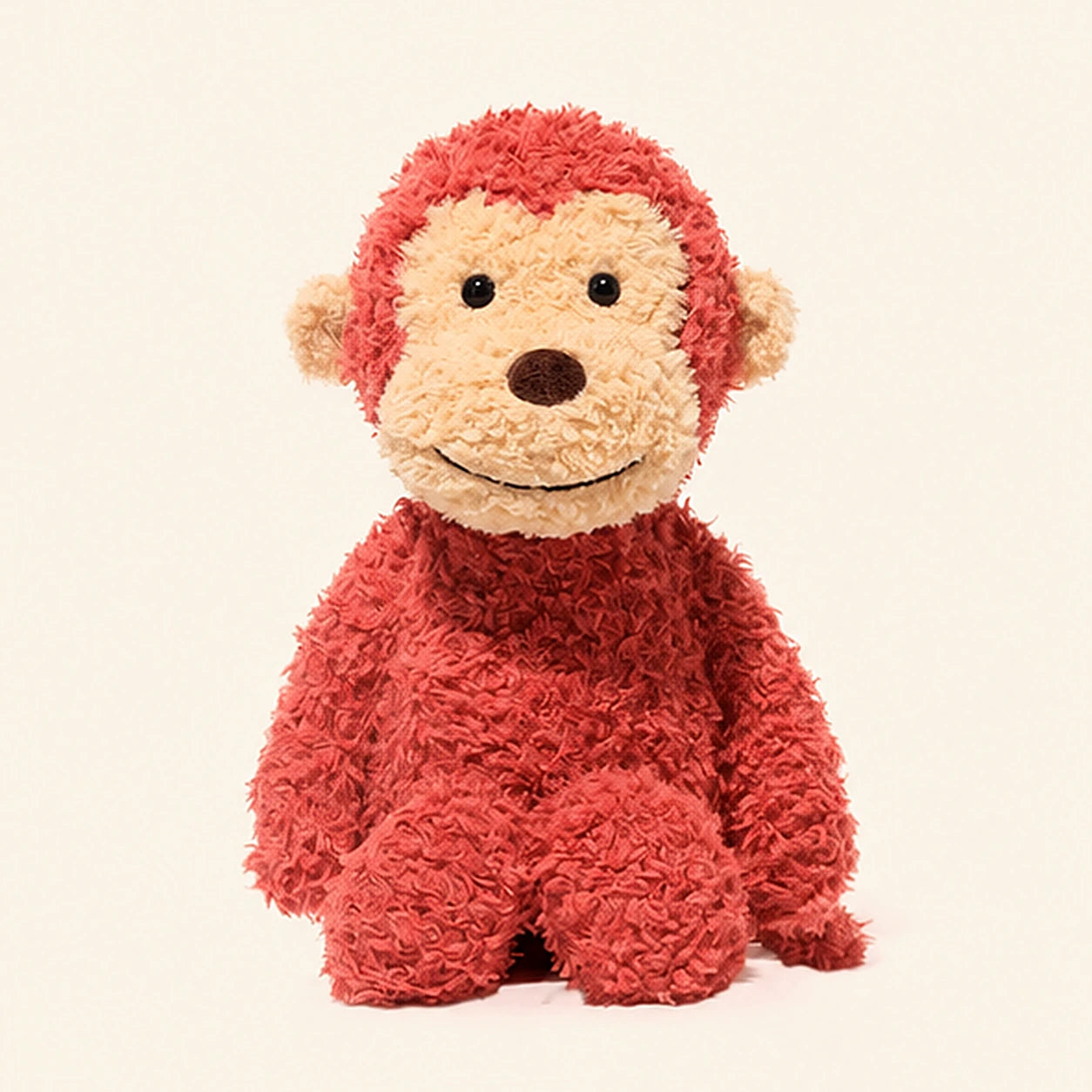 Peluche singe rouge vue de face
