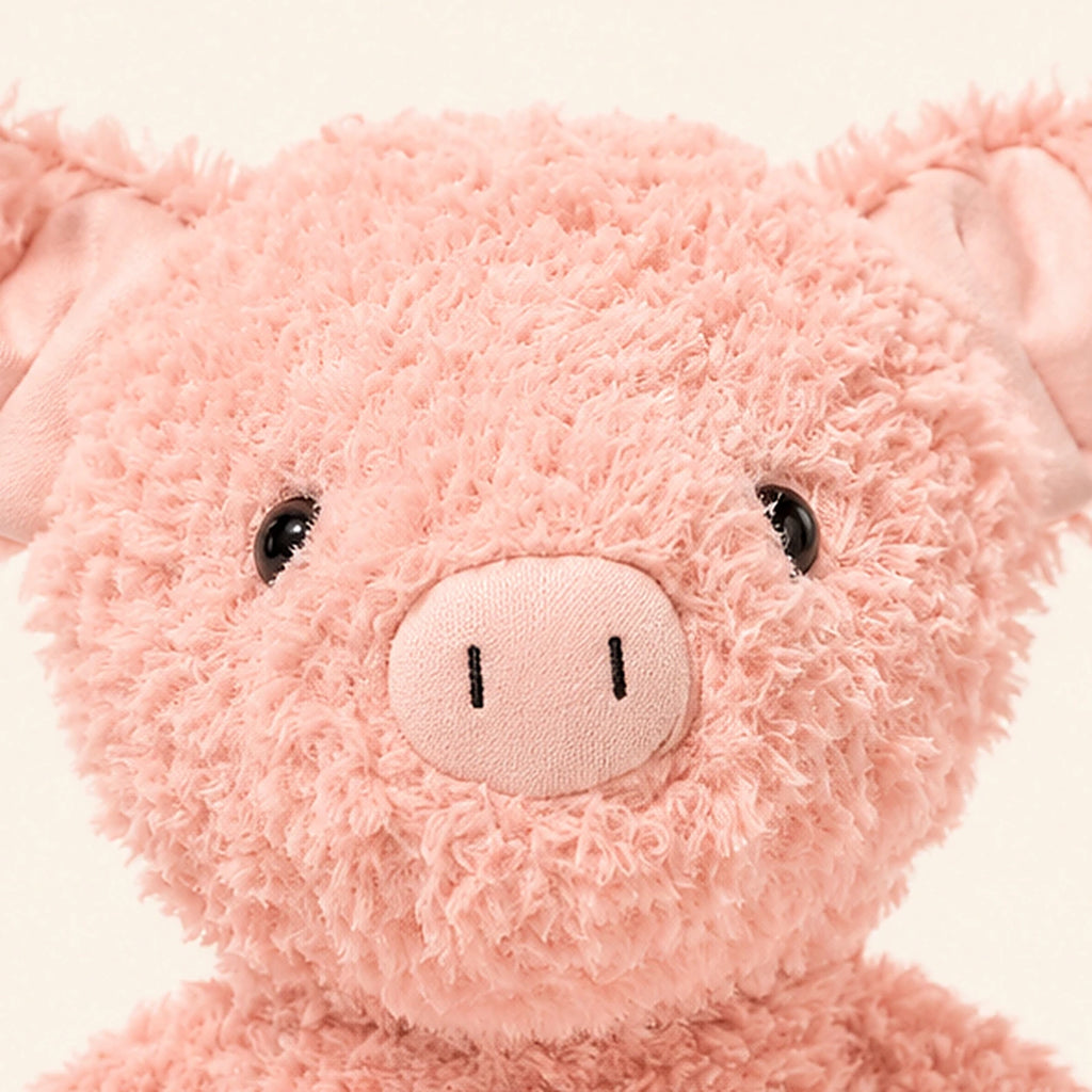 Peluche cochon rose gros plan visage
