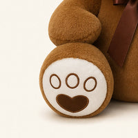 ours en peluche brun fonce 50 cm gros plan visage