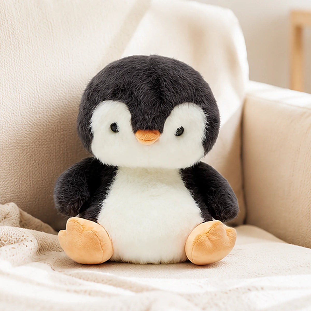 peluche pingouin en situation