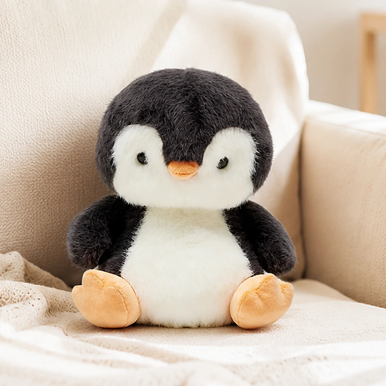 peluche pingouin en situation