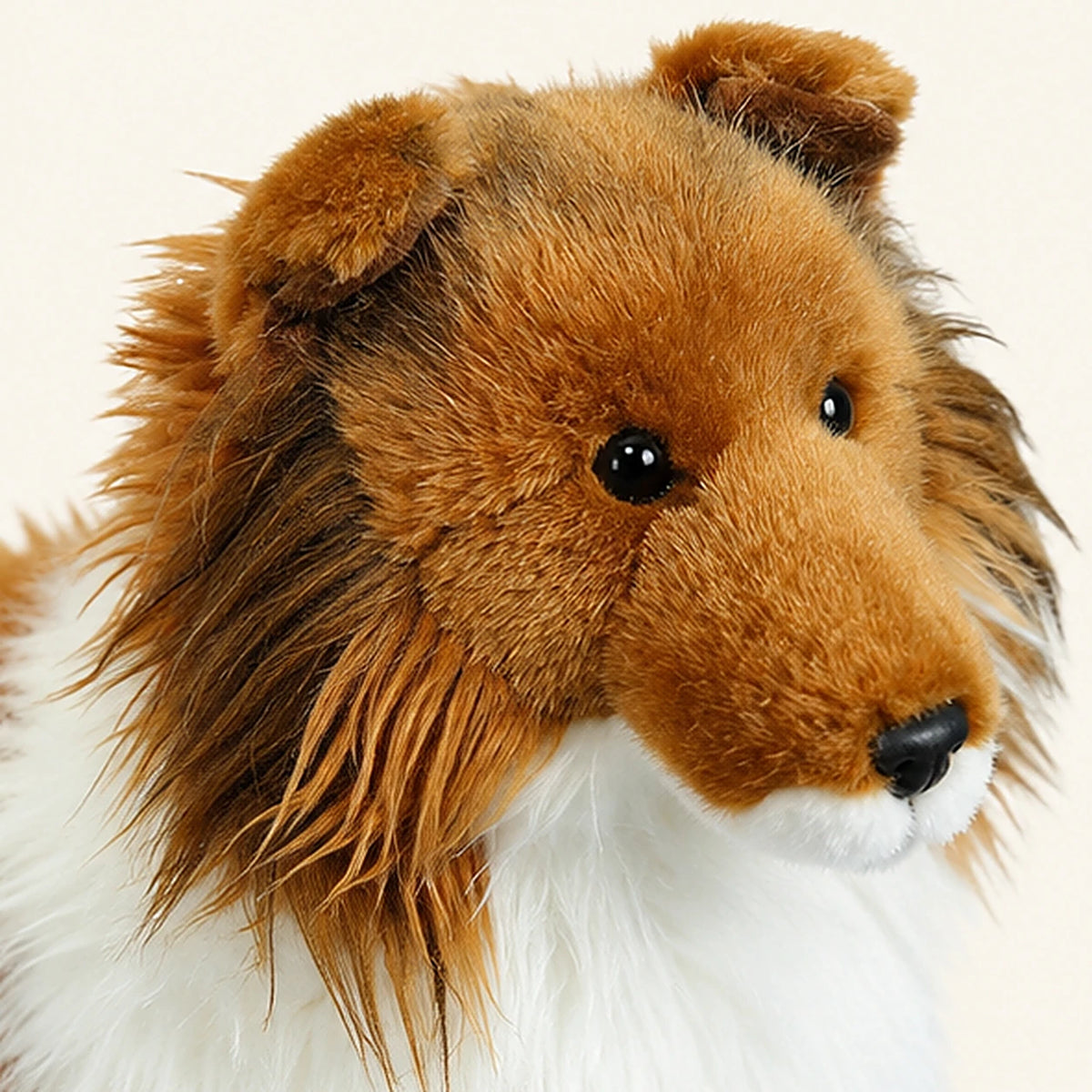 Peluche berger shetland realiste 25 cm gros plan visage